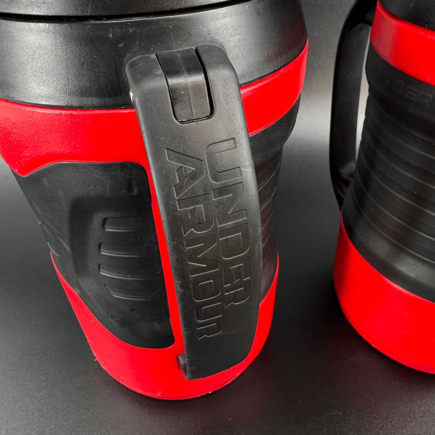 Under Armour Lot of 2 Playmaker Water Jug 64 oz Bottle Red Black w/Fence Hook