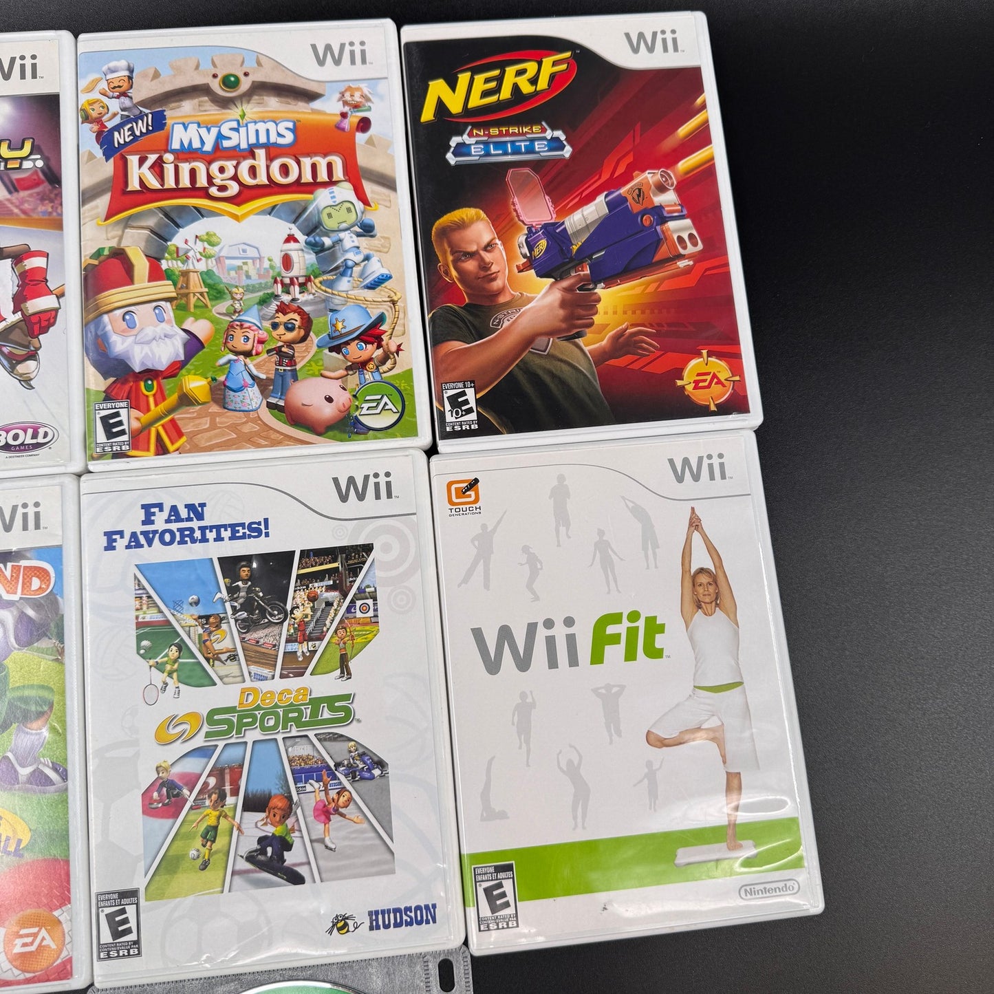 Nintendo Wii Video Game Lot Bundle 7 Games Collection Wii Fit MySims Nerf Hockey