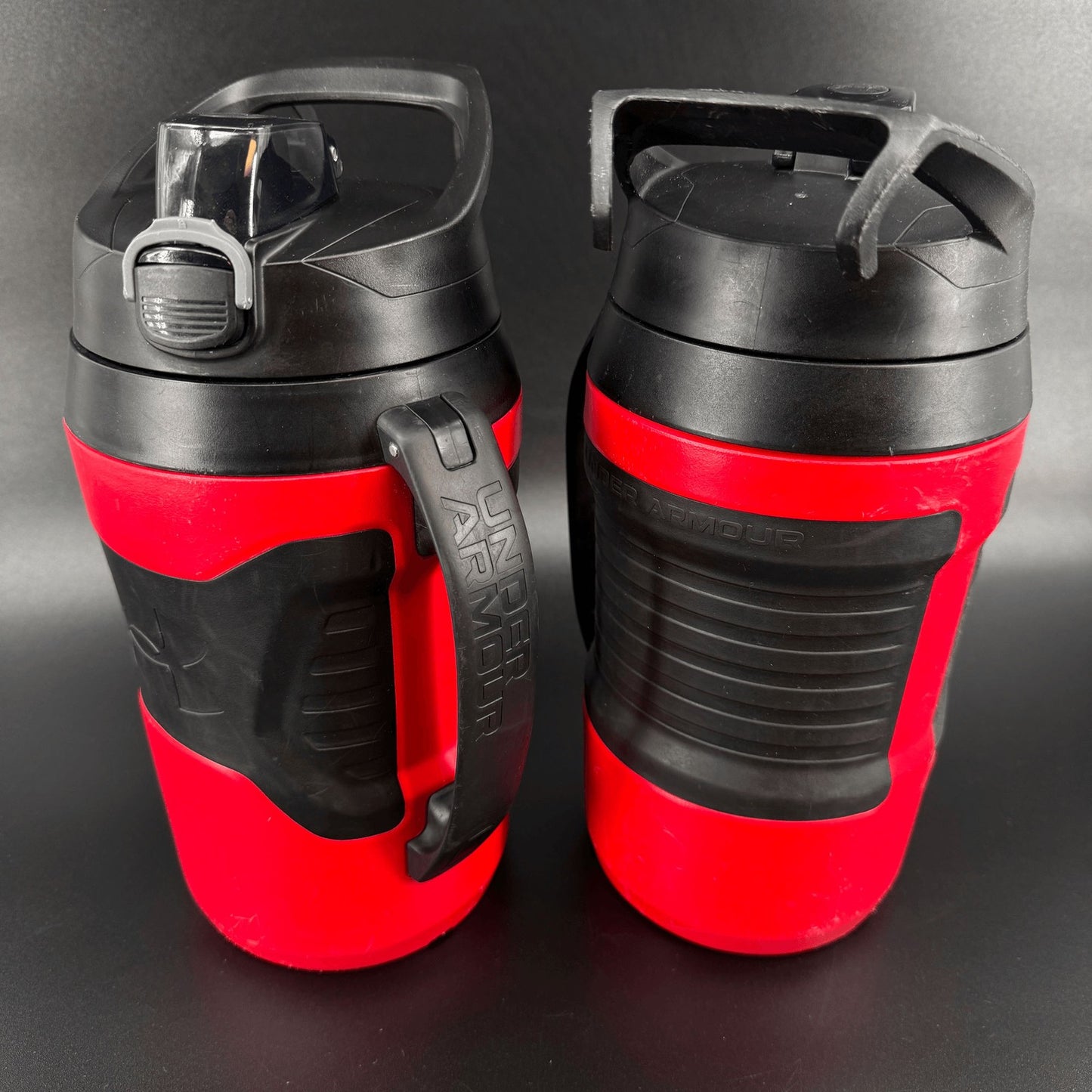 Under Armour Lot of 2 Playmaker Water Jug 64 oz Bottle Red Black w/Fence Hook