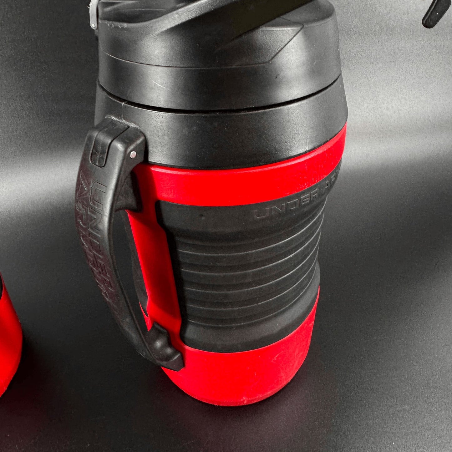 Under Armour Lot of 2 Playmaker Water Jug 64 oz Bottle Red Black w/Fence Hook